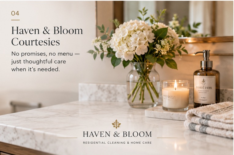 Haven & Bloom Courtesies &mdash; flowers, a lit candle and folded towels arranged on a counter